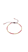 Bracelet with red and gold cord on a white background