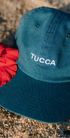 blue baseball cap with white embroidery 