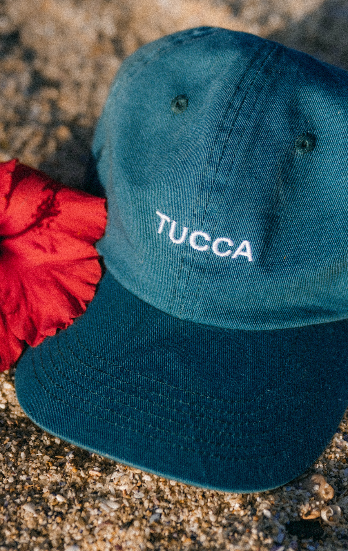 blue baseball cap with white embroidery 