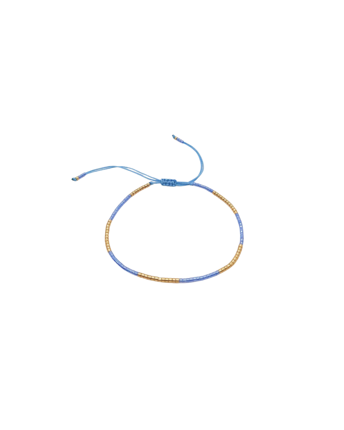 Blue and gold bracelet on a white background