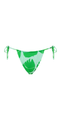 Green and white bikini bottom with leaf pattern on a white background