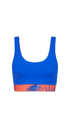 Blue active top with red and purple palm tree design on a white background