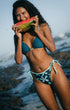 mix and match reversible swimwear on a beach 
