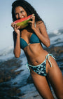 mix and match reversible swimwear on a beach 